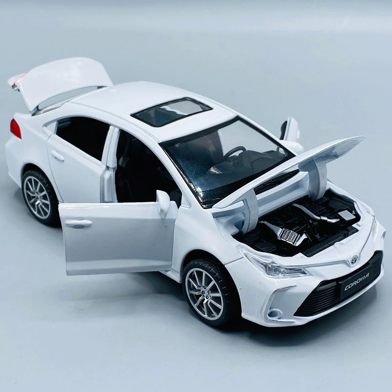 Corolla Toy Car with Smart Sensor Touch High-Quality Kids Toy Vehicle (Random Colors Available) - Image 4