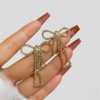 PQT-985 Touch Of Glamour To Your Look With These Bow Shape Zircon Korean Earrings – Color Golden - Image 3