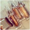 Huda Beauty N.Y.M.P.H. All Over Body Highlighter – Liquid Illuminator for Face, Body & Legs – Water-Based, Long-Lasting Glow – 35 ml - Image 4