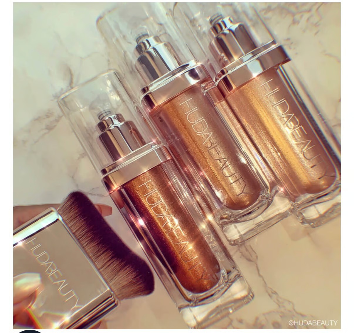 Huda Beauty N.Y.M.P.H. All Over Body Highlighter – Liquid Illuminator for Face, Body & Legs – Water-Based, Long-Lasting Glow – 35 ml - Image 4