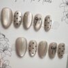 Pack of 12 - Cat Eye Nails Luminous Magnetic Effect Soft Nude Champagne Gold Almond Nails With Shimmer Polka Dots And Fine Bow Line Art (Random Design)